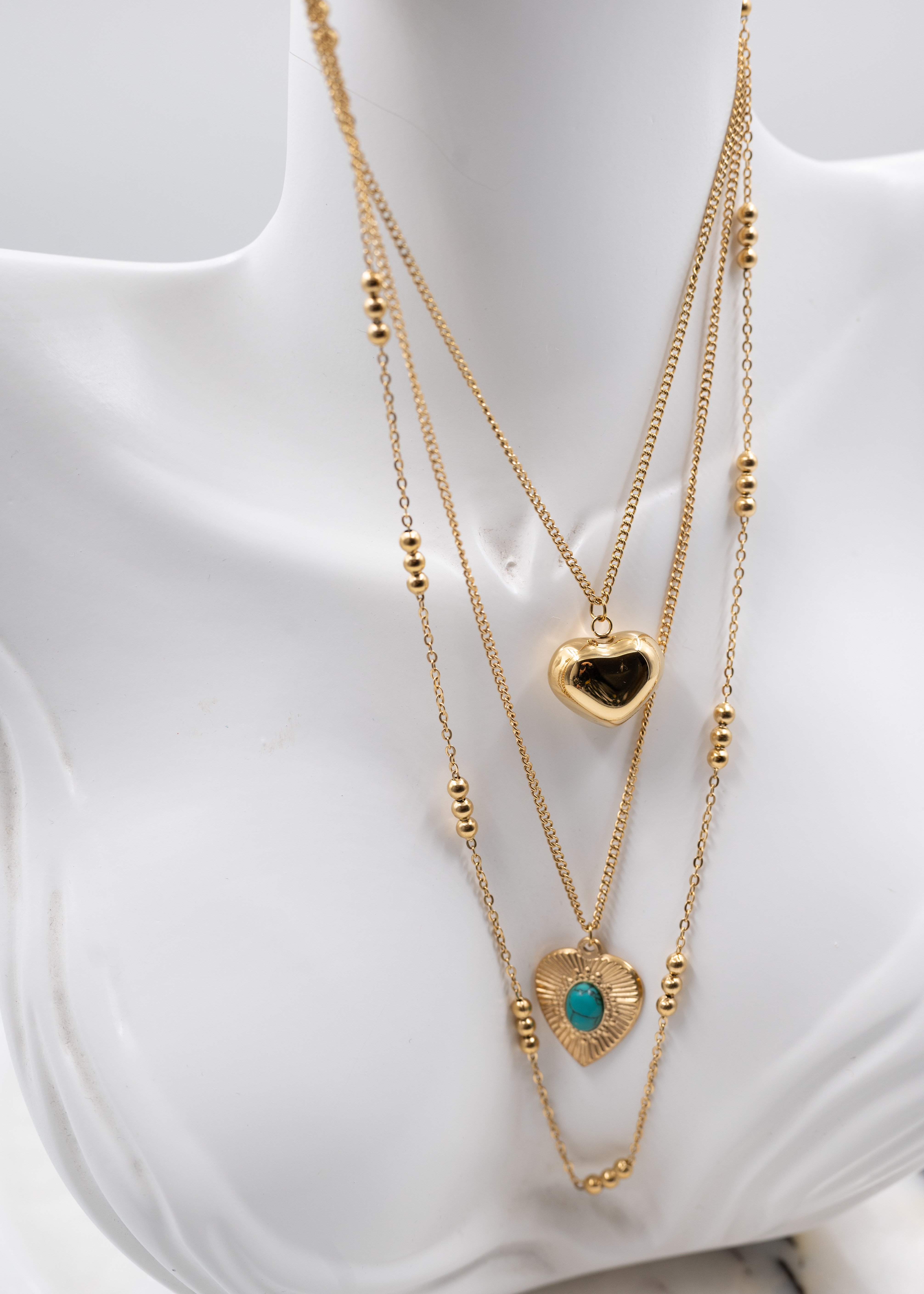 Mavi Desenli Kalpli Gold Çelik Kolye